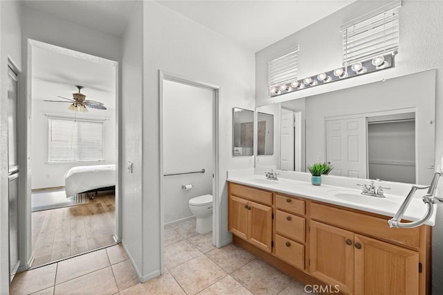 28253 Harmony Ln, Menifee, CA 92584 - ensuite bathroom with double vanity, ceiling fan, and tile patterned floors