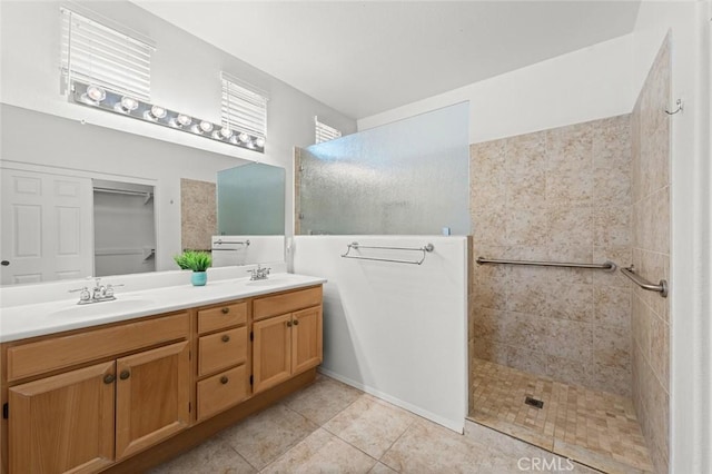 28253 Harmony Ln, Menifee, CA 92584 - bathroom featuring double vanity, walk in shower, and tile patterned floors