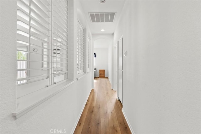 28253 Harmony Ln, Menifee, CA 92584 - hallway featuring hardwood / wood-style floors and baseboards