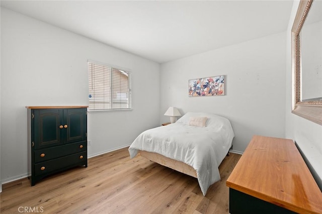 28253 Harmony Ln, Menifee, CA 92584 - bedroom featuring light wood-type flooring and baseboards