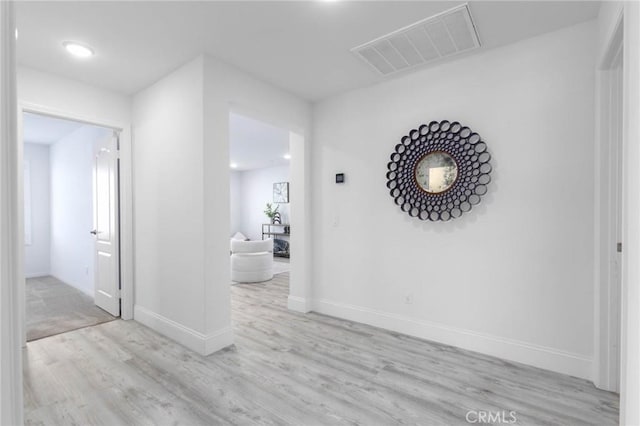 4062 Tamarind Rdg, Lake Elsinore, CA 92530 - corridor featuring wood finished floors, healthy amount of natural light, and recessed lighting