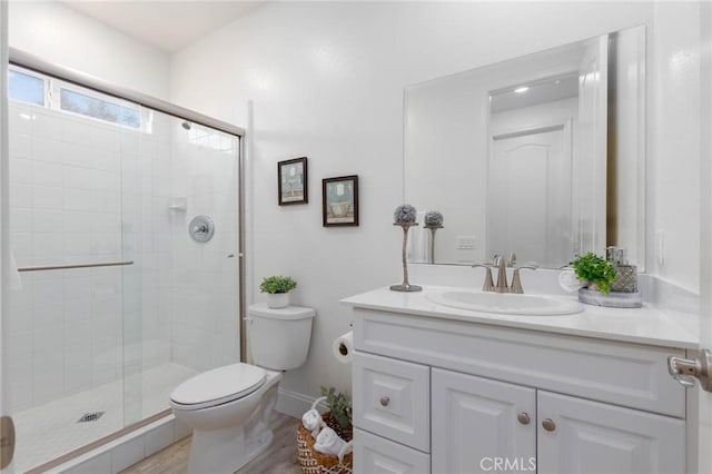 4062 Tamarind Rdg, Lake Elsinore, CA 92530 - bathroom featuring vanity, a stall shower, and wood finished floors