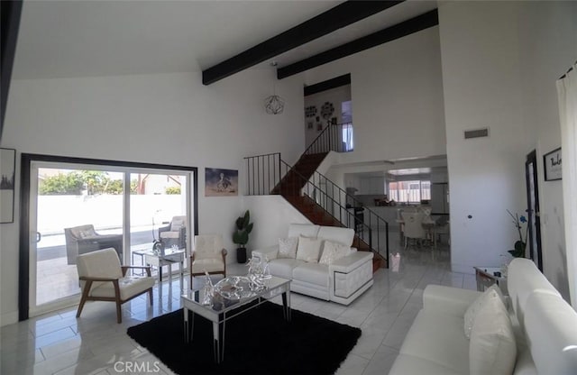 19912 Claretta Ave, Cerritos, CA 90703 - living area featuring a towering ceiling, stairs, and beamed ceiling