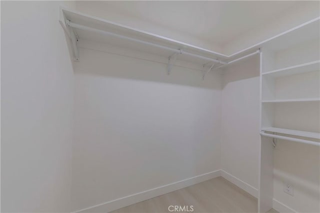 645 N Gramercy Pl, Los Angeles, CA 90004 - walk in closet with light wood finished floors