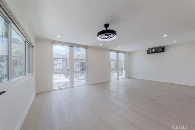 645 N Gramercy Pl, Los Angeles, CA 90004 - unfurnished room featuring light wood-style floors, recessed lighting, and ornamental molding
