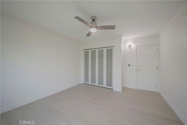 645 N Gramercy Pl, Los Angeles, CA 90004 - spare room with light wood finished floors, ceiling fan, and crown molding
