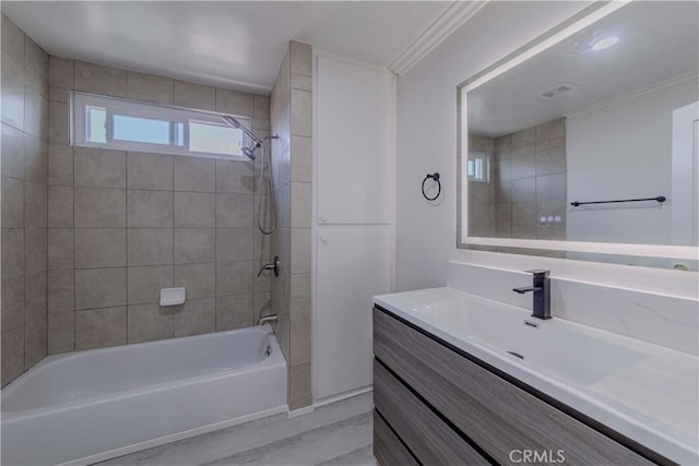 645 N Gramercy Pl, Los Angeles, CA 90004 - bathroom featuring vanity, bathing tub / shower combination, and crown molding