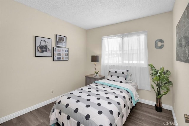 1047 E Huntington Dr Unit D, Monrovia, CA 91016 - bedroom featuring dark wood-style floors and a textured ceiling
