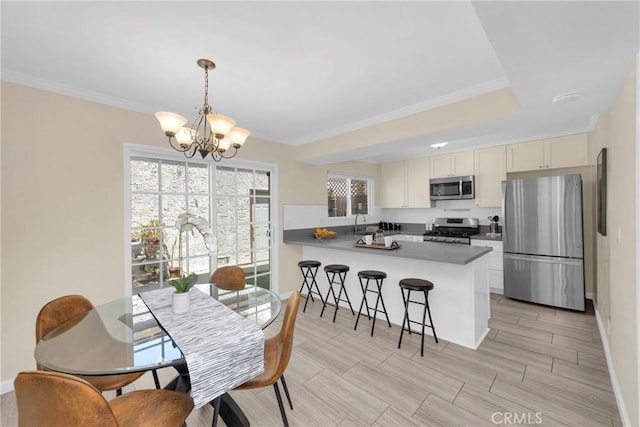 1047 E Huntington Dr Unit D, Monrovia, CA 91016 - dining room featuring a chandelier and ornamental molding