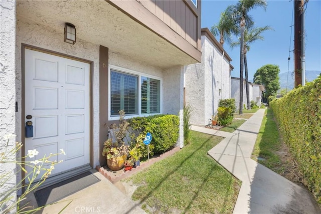 1047 E Huntington Dr Unit D, Monrovia, CA 91016 - property entrance featuring stucco siding
