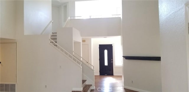 12180 Westerly Trl, Moreno Valley, CA 92557 - entrance foyer featuring stairway and wood finished floors