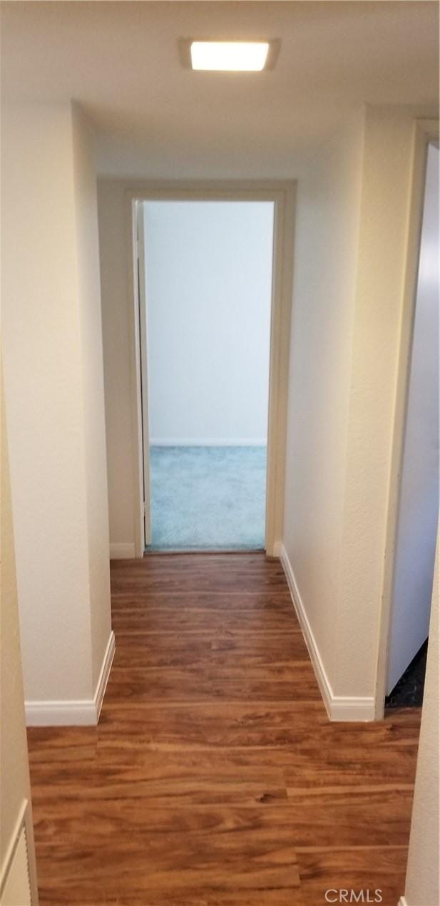 12180 Westerly Trl, Moreno Valley, CA 92557 - corridor with wood finished floors