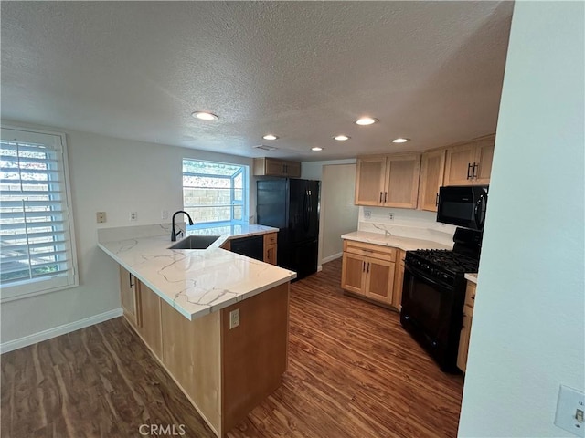 12180 Westerly Trl, Moreno Valley, CA 92557 - kitchen with black appliances, a textured ceiling, dark wood finished floors, a peninsula, and recessed lighting