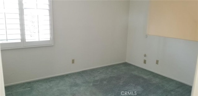 12180 Westerly Trl, Moreno Valley, CA 92557 - unfurnished room featuring carpet floors and baseboards