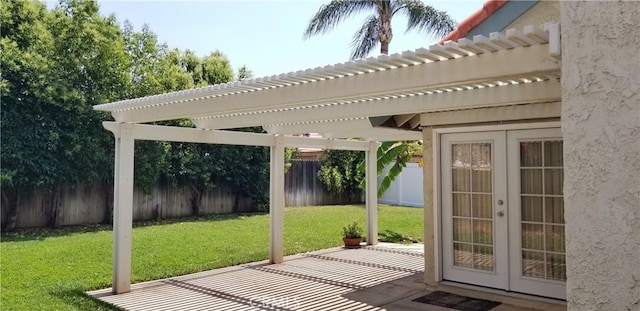 12180 Westerly Trl, Moreno Valley, CA 92557 - fenced backyard featuring a pergola, a patio area, and french doors