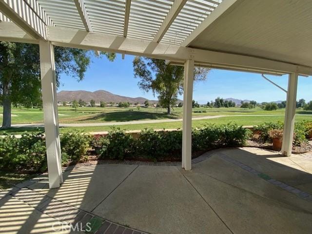28380 Champions Dr, Menifee, CA 92584 - view of patio featuring a mountain view and a pergola