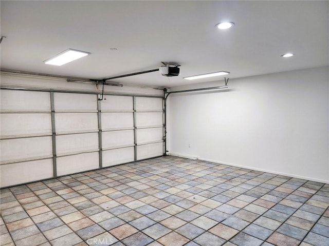 10201 Mason Ave Unit 34, Chatsworth, CA 91311 - garage featuring a garage door opener and recessed lighting