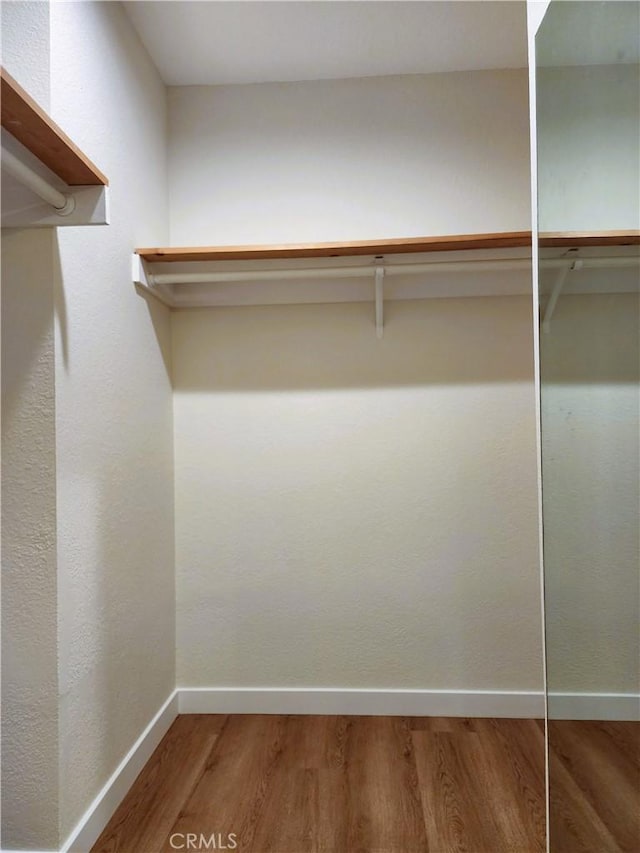 10201 Mason Ave Unit 34, Chatsworth, CA 91311 - spacious closet featuring wood finished floors