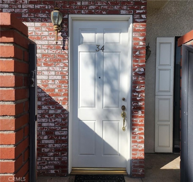10201 Mason Ave Unit 34, Chatsworth, CA 91311 - property entrance featuring brick siding