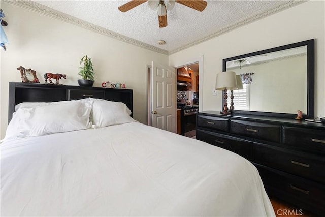 430 E 104th St, Los Angeles, CA 90003 - bedroom with a textured ceiling and a ceiling fan