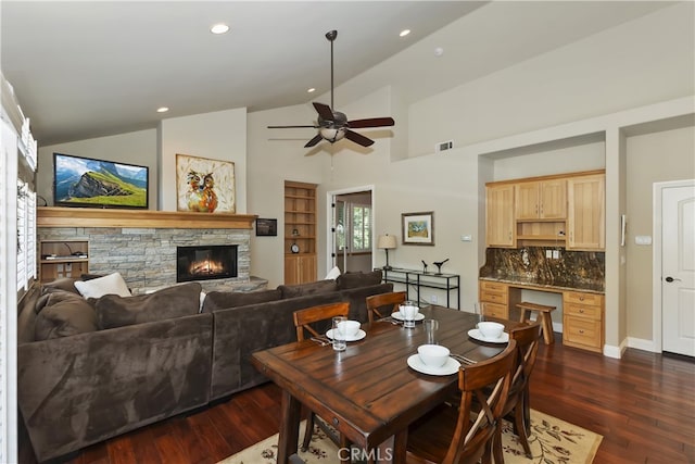 1179 Aleutian Dr, Lake Arrowhead, CA 92352 - dining space with dark wood-type flooring, a fireplace, a ceiling fan, recessed lighting, and high vaulted ceiling