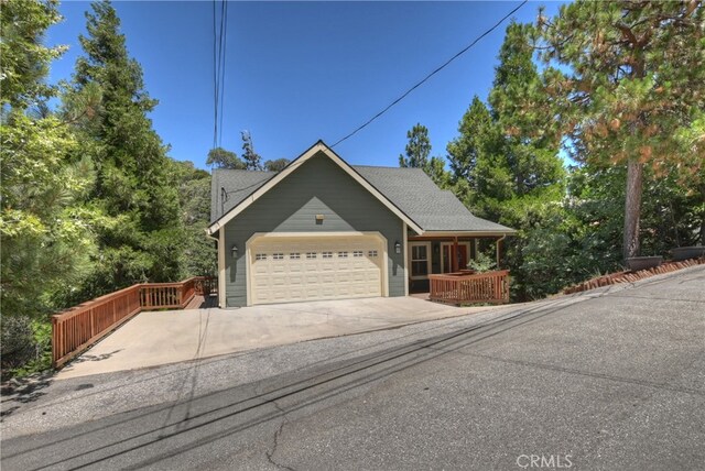 1179 Aleutian Dr, Lake Arrowhead, CA 92352 - view of front of property with an attached garage and driveway