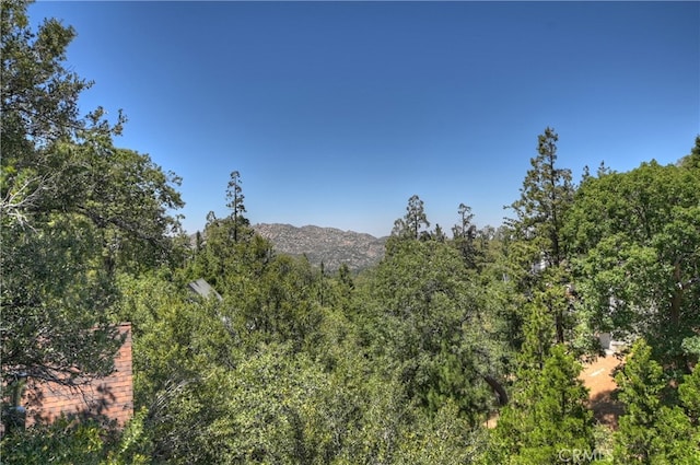 1179 Aleutian Dr, Lake Arrowhead, CA 92352 - view of mountain background featuring a heavily wooded area