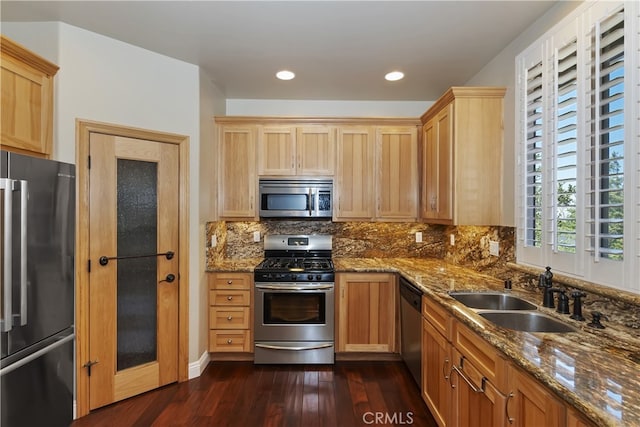 1179 Aleutian Dr, Lake Arrowhead, CA 92352 - kitchen with stainless steel appliances, dark wood-style floors, tasteful backsplash, dark stone countertops, and recessed lighting