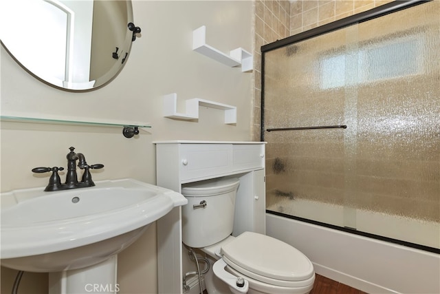 1179 Aleutian Dr, Lake Arrowhead, CA 92352 - bathroom featuring combined bath / shower with glass door and a sink