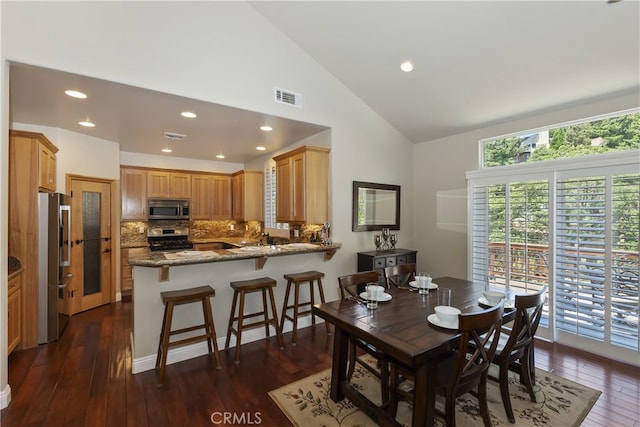 1179 Aleutian Dr, Lake Arrowhead, CA 92352 - dining space featuring dark wood finished floors, recessed lighting, and high vaulted ceiling