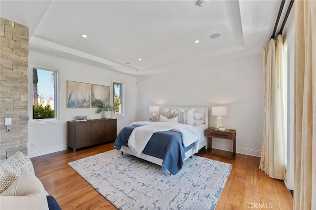 3201 4th Ave, Corona Del Mar, CA 92625 - bedroom featuring a raised ceiling, light wood-style floors, and recessed lighting
