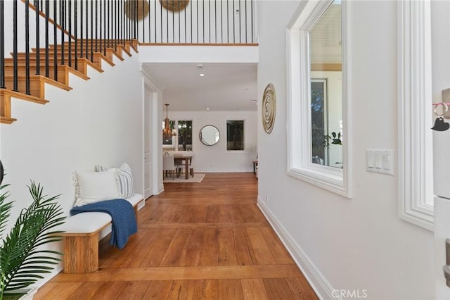 3201 4th Ave, Corona Del Mar, CA 92625 - hallway with wood-type flooring and stairway