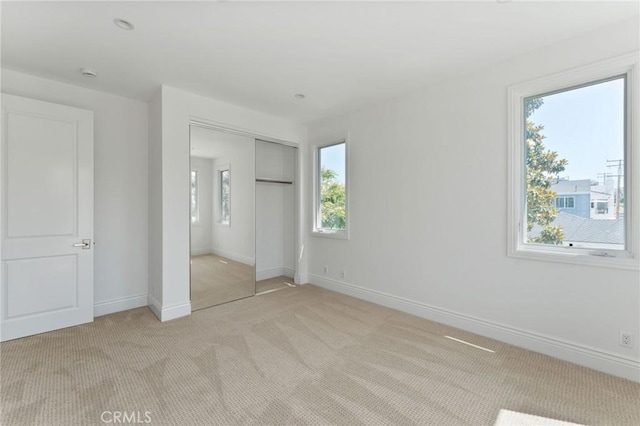 3201 4th Ave, Corona Del Mar, CA 92625 - unfurnished bedroom with light carpet and a closet