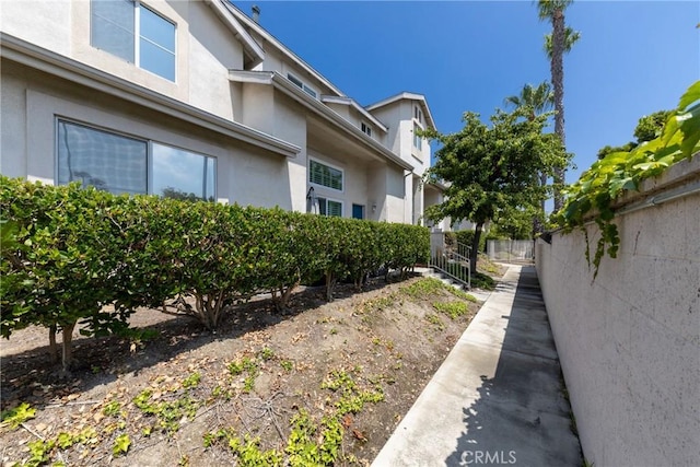 23220 Colony Park Dr, Carson, CA 90745 - view of side of property featuring stucco siding