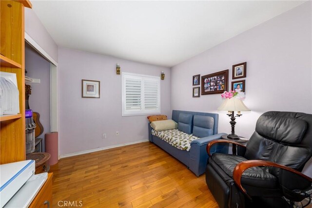 23220 Colony Park Dr, Carson, CA 90745 - living room featuring light wood-style floors and baseboards