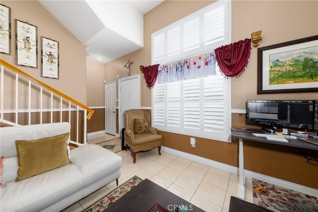23220 Colony Park Dr, Carson, CA 90745 - living room featuring a desk, light tile patterned floors, stairs, and high vaulted ceiling