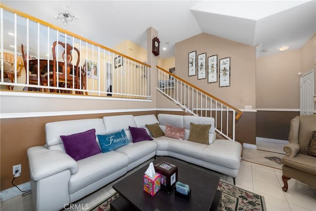 23220 Colony Park Dr, Carson, CA 90745 - living area with stairs, vaulted ceiling, and tile patterned flooring