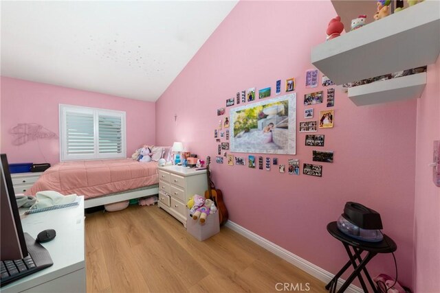 23220 Colony Park Dr, Carson, CA 90745 - bedroom featuring light wood-type flooring and lofted ceiling