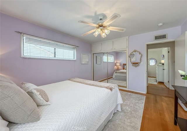 10424 Gloria Ave, Granada Hills, CA 91344 - bedroom with light wood-type flooring, a closet, and a ceiling fan