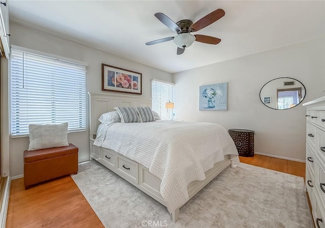 10424 Gloria Ave, Granada Hills, CA 91344 - bedroom with light wood finished floors and ceiling fan