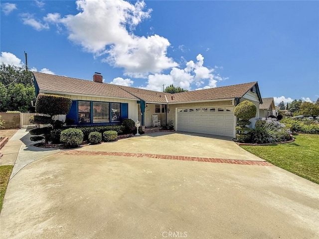 10424 Gloria Ave, Granada Hills, CA 91344 - single story home with a garage, driveway, a chimney, and a front lawn