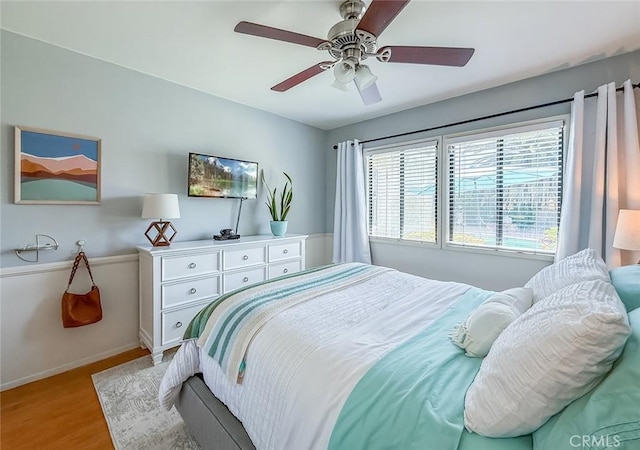 10424 Gloria Ave, Granada Hills, CA 91344 - bedroom with light wood finished floors and ceiling fan