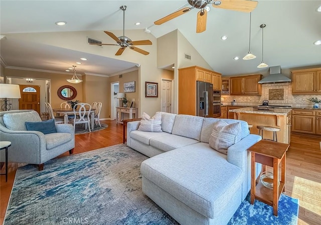 10424 Gloria Ave, Granada Hills, CA 91344 - living area featuring ceiling fan, light wood-style floors, ornamental molding, recessed lighting, and high vaulted ceiling