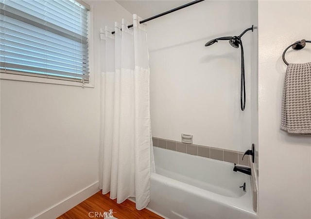 10424 Gloria Ave, Granada Hills, CA 91344 - full bath featuring shower / bathtub combination with curtain and wood finished floors