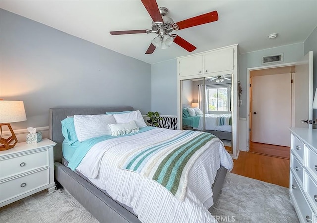 10424 Gloria Ave, Granada Hills, CA 91344 - bedroom with a closet, light wood-type flooring, and ceiling fan