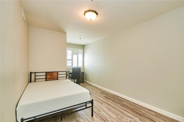 580 W Main St Unit 105, Alhambra, CA 91801 - bedroom featuring wood finished floors