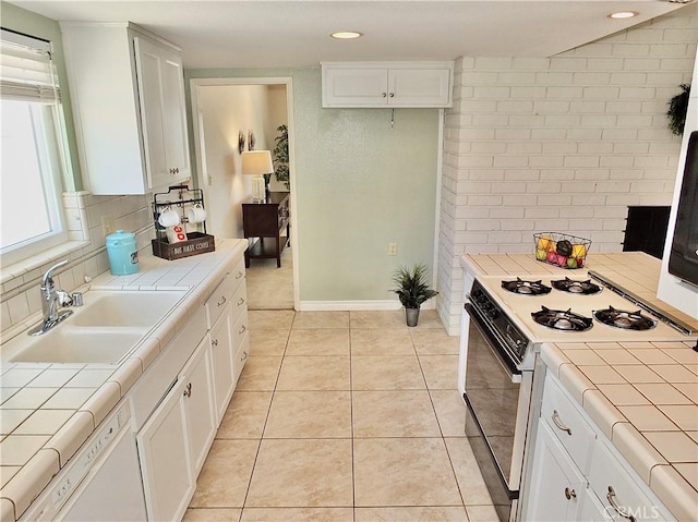 2524 Littleton Pl, Costa Mesa, CA 92626 - kitchen with tile countertops, white appliances, white cabinets, tasteful backsplash, and recessed lighting