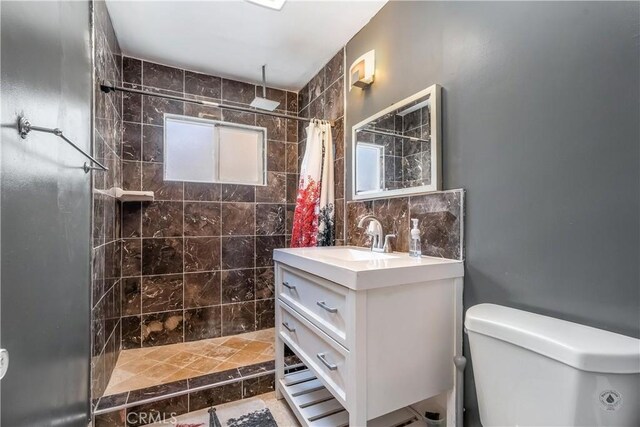 7549 Variel Ave, Canoga Park, CA 91303 - full bathroom featuring vanity and a tile shower