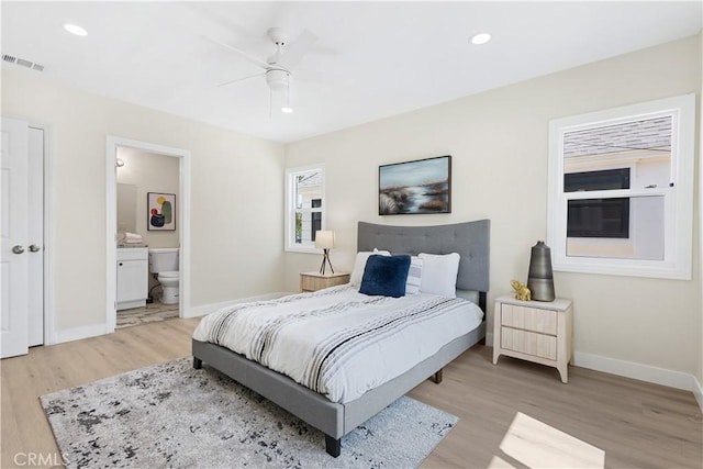3876 Olmsted Ave, Los Angeles, CA 90008 - bedroom with light wood-style flooring, recessed lighting, ensuite bathroom, and ceiling fan