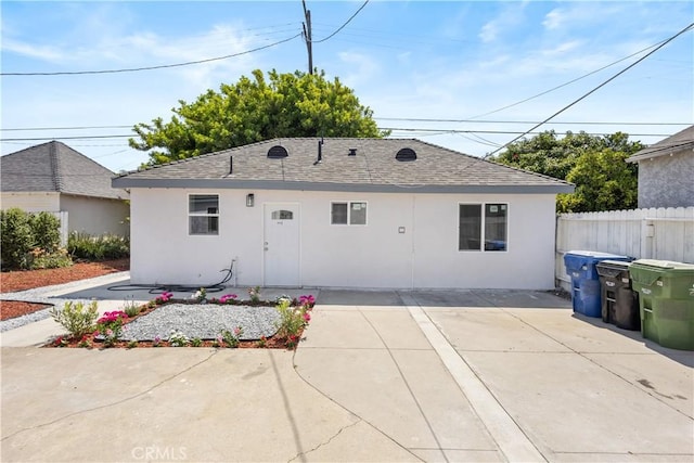 3876 Olmsted Ave, Los Angeles, CA 90008 - view of front of home with a patio, roof with shingles, and stucco siding